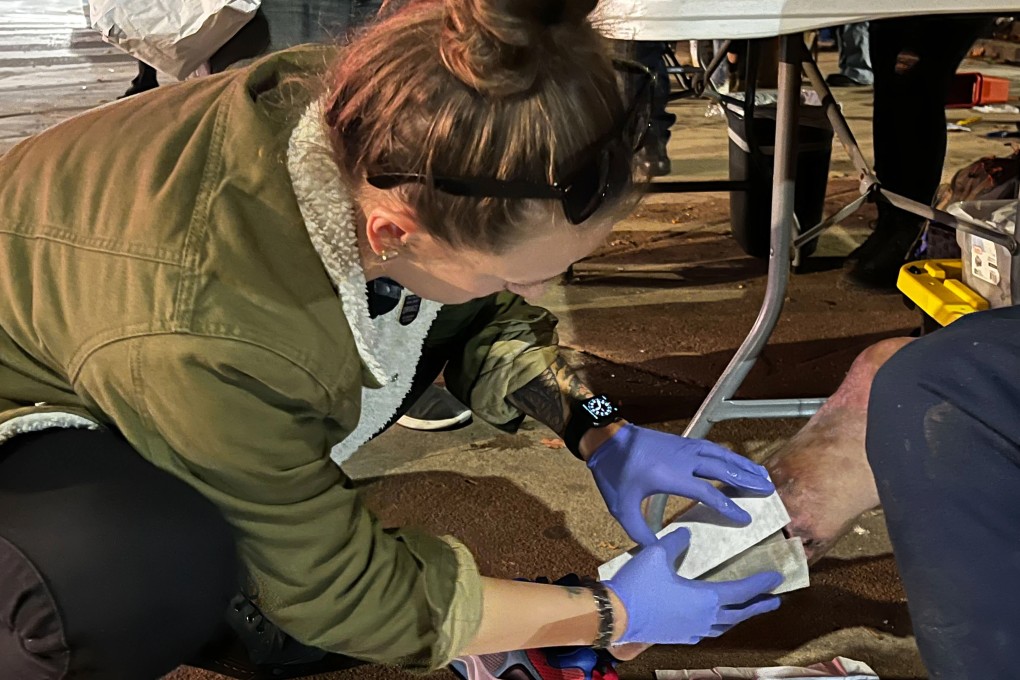 A nurse applies a bandage to the leg of a serious ‘tranq’ user in Philadelphia’s Kensington neighbourhood. Injecting the drug can cause severe skin wounds that could lead to amputation. Photo: TNS