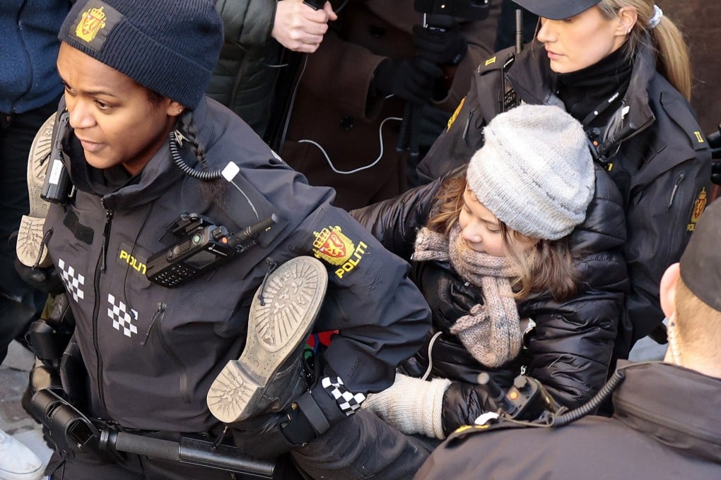 Police in Oslo remove Swedish environmental activist Greta Thunberg during a demonstration against wind turbines on land used by indigenous people. Photo: EPA-EFE