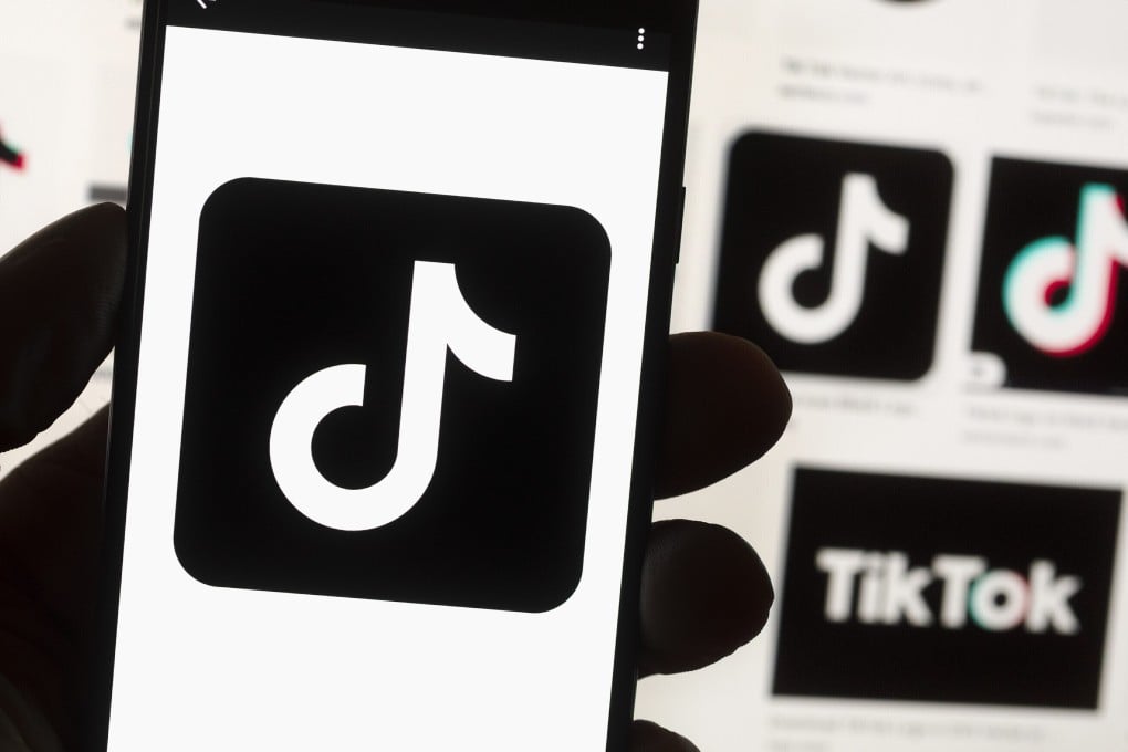 The TikTok logo is seen on a smartphone. Numerous Western countries have banned the Chinese video-sharing app from government devices in recent weeks. Photo: AP