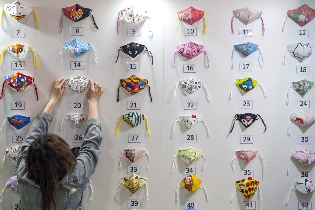 While wearing masks in most places is no longer mandatory in Hong Kong, residents can avoid letting their supplies go to waste. Photo: Felix Wong