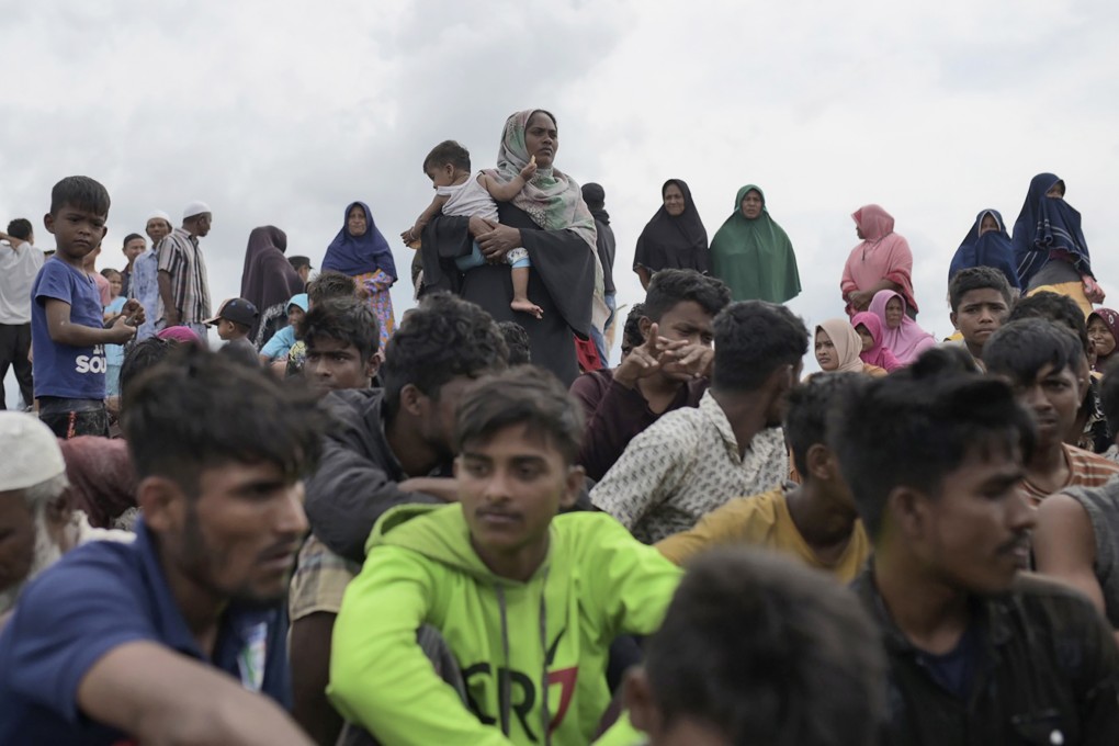 Rohingya rest on Lampanah Leungah beach after landing in Aceh province, Indonesia on February 16, 2023. Photo: AP