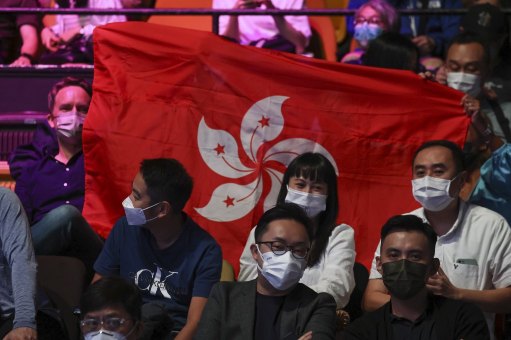 Audience members hold a Hong Kong SAR flag in a snooker match at the Hong Kong Masters in October of last year. The city’s representation at sports games has been plagued by instances of the wrong song being played instead of the Chinese national anthem. Photo: K.Y. Cheng