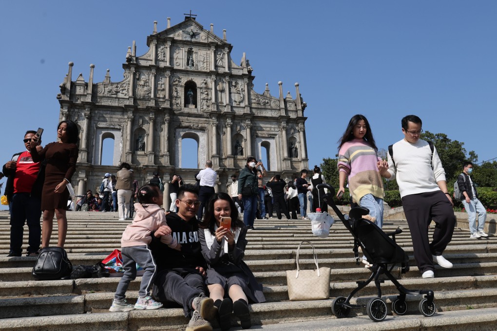 Tourists go mask-free in Macau in February. Photo: Edmond So