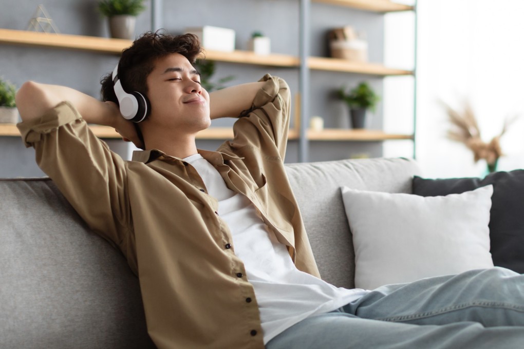 Using headphones that go over your ears rather than earbuds that are inserted in the ears may help safeguard your hearing. Above all, don’t play your music too loud, says an expert on hearing loss, a growing global problem that can have other health impacts. Photo: Shutterstock
