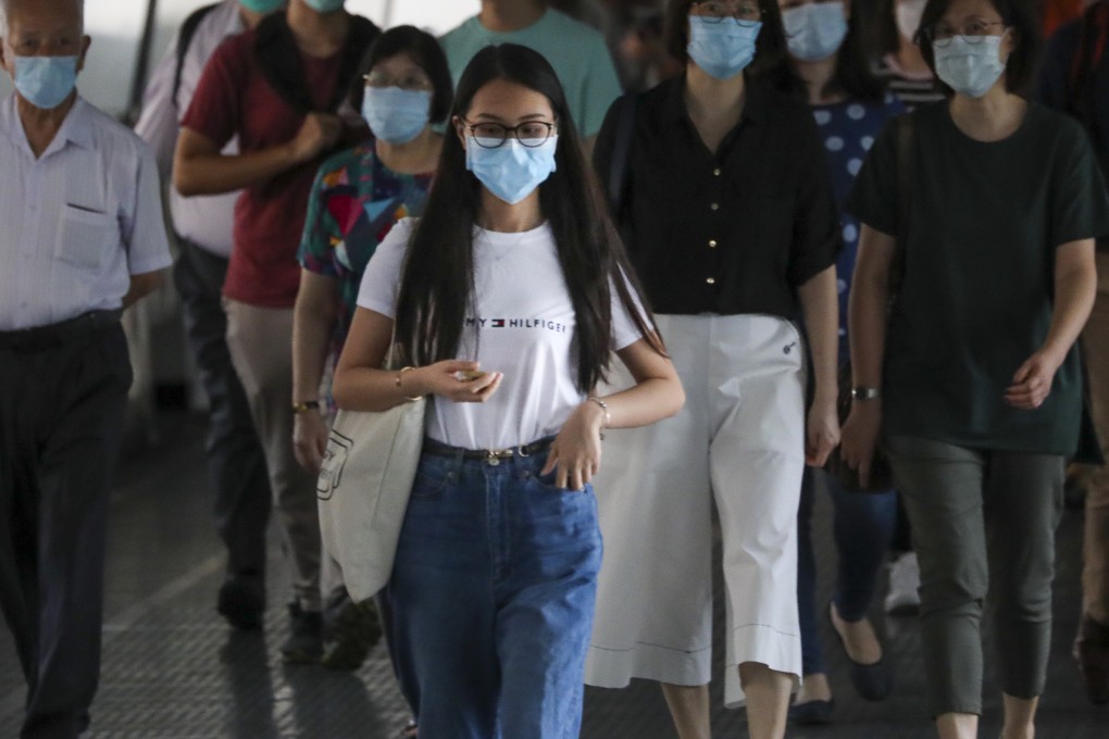 People walking in Central, Hong Kong, in July 2020. While Hongkongers are well dressed, there is no individuality, says Kate Whitehead. Photo: SCMP