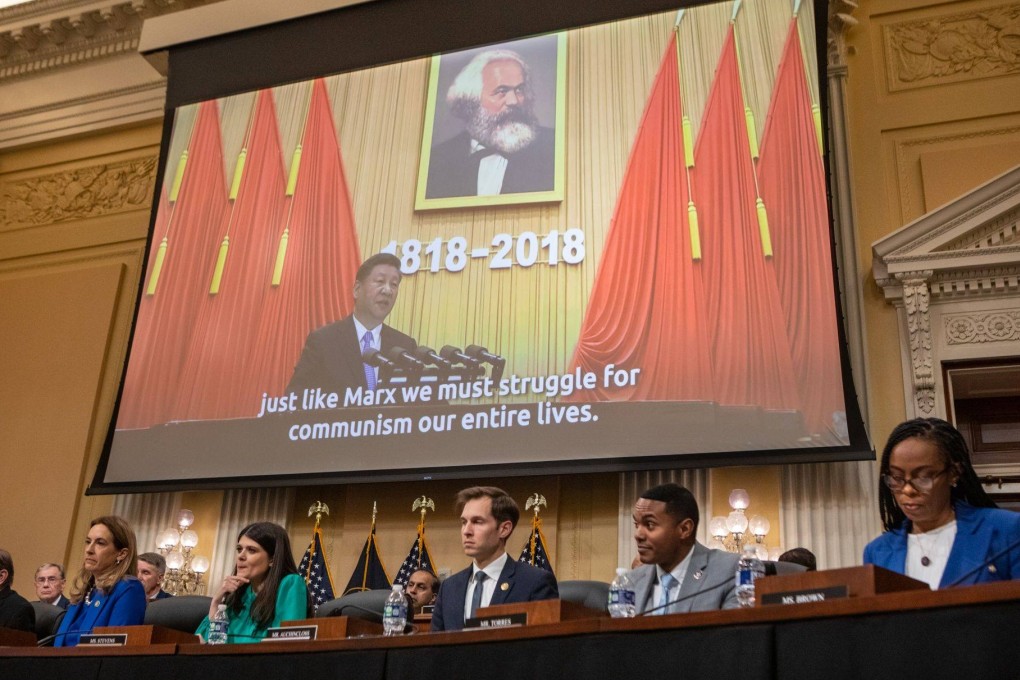 US House committee members watch a video about China’s Communist Party during a hearing in Washington on Tuesday. Photo: Bloomberg