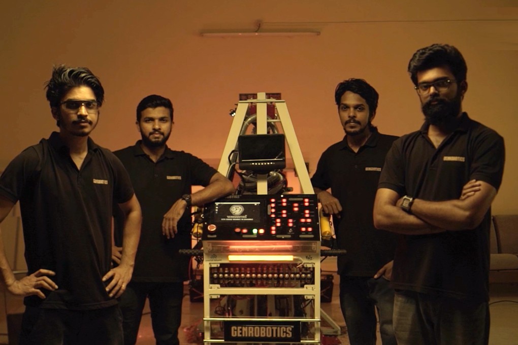 Genrobotics founders Vimal Govind, Rashid K, Arun George and Nikhil NP with the first prototype of the Bandicoot. Photo: Handout