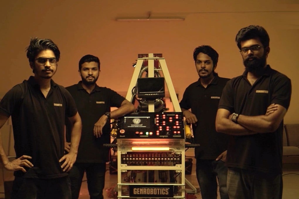Genrobotics founders Vimal Govind, Rashid K, Arun George and Nikhil NP with the first prototype of the Bandicoot. Photo: Handout