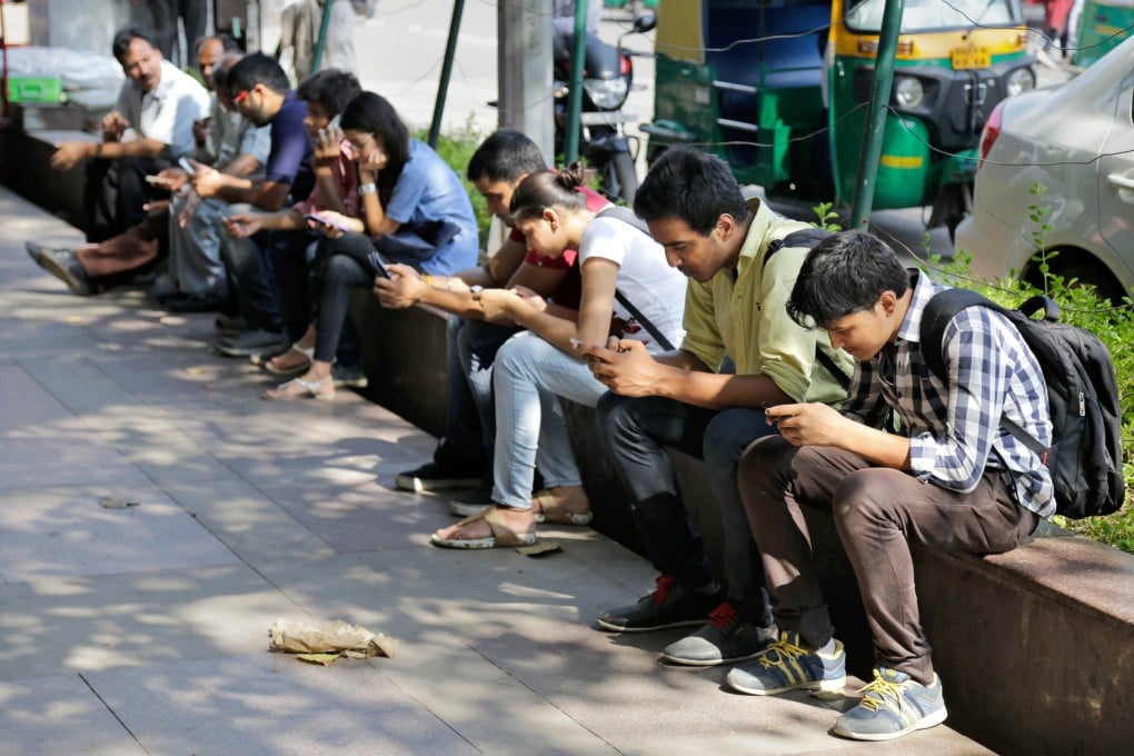 An Indian village is calling for its 15,000 residents to turn off their phones and televisions at sundown in a “digital detox” campaign. Photo: AP