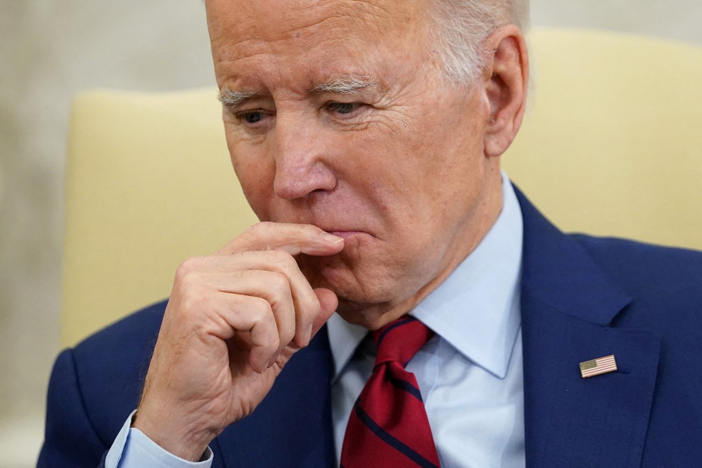US President Joe Biden listens during his meeting with German Chancellor Olaf Scholz in the White House on Friday. Photo: Reuters