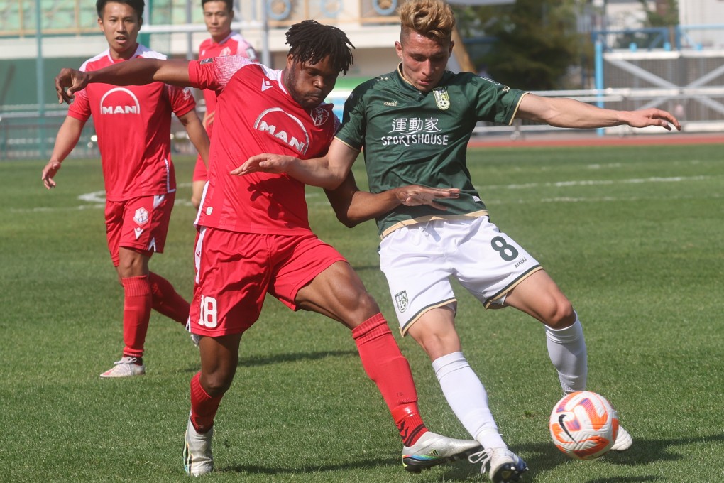 Mahama Awal battles for the ball with Sham Shui Po’s Nicholas Benavides Medeiros. Photo: Yik Yeung-man