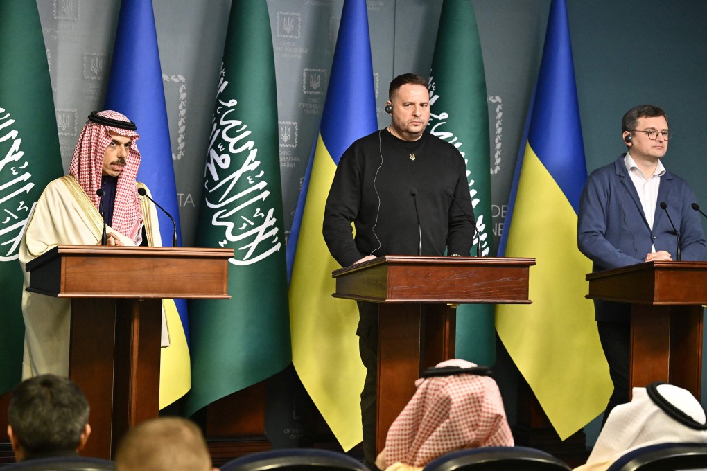 Saudi Arabia’s foreign minister Prince Faisal bin Farhan Al-Saud, left, head of Ukraine’s presidential office Andriy Yermak, centre, and Ukraine’s foreign minister Dmytro Kuleba in Kyiv, Ukraine on February 26. Photo: AFP / Getty Images / TNS