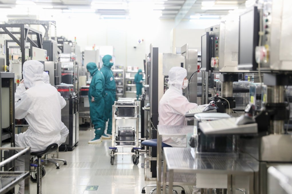 Staff members at a semiconductor workshop in Shanghai on February 10, 2020. Photo: Xinhua