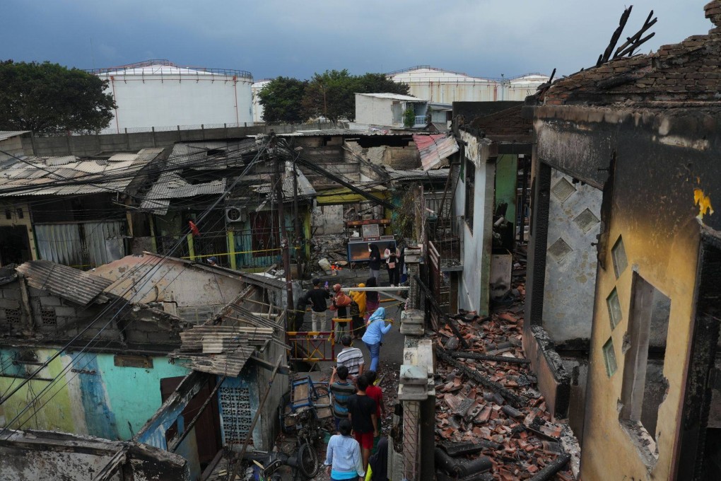 Burned homes following a fire near a PT Pertamina facility in Jakarta, Indonesia, on Saturday. Photo: Bloomberg