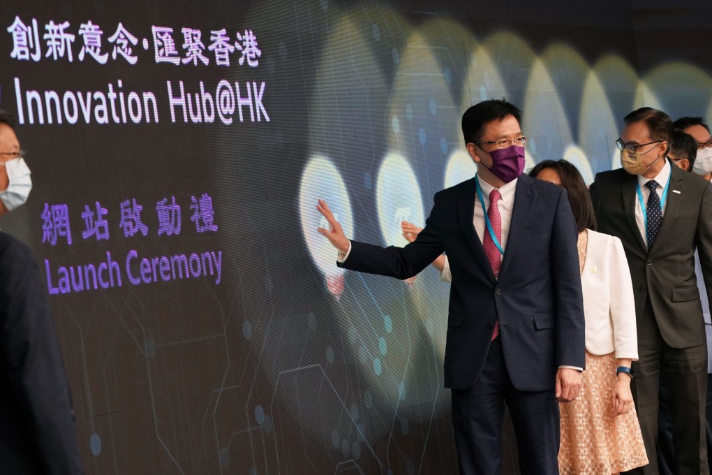 Secretary for Innovation, Technology and Industry Sun Dong (purple mask) attends the launch of the Innovation Hub@HK website at the Hong Kong Productivity Council Building in Kowloon Tong on August 18. Hong Kong’s institutional environment positions it well to become an innovation centre of a much larger scale. Photo: Felix Wong