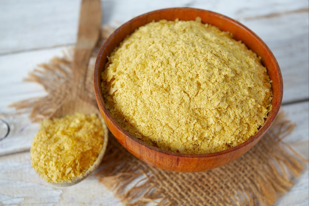 Nutritional yeast has a nutty, savoury taste similar to Parmesan cheese, and is packed with B vitamins and antioxidants, making it a favourite among vegans and vegetarians, who often call it an “umami bomb”. Photo: Shutterstock