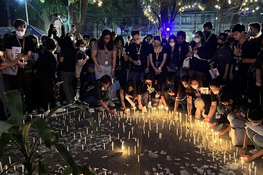 Students of Adamson University hold a candlelight vigil for John Matthew Salilig. Photo: Facebook/Adamson University