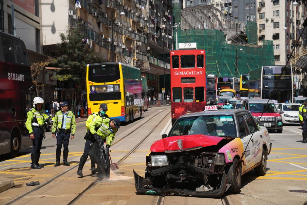 Police investigate a traffic accident in Fortress Hill on March 5. An 84-year-old taxi driver has been charged with dangerous driving. Photo: Sam Tsang