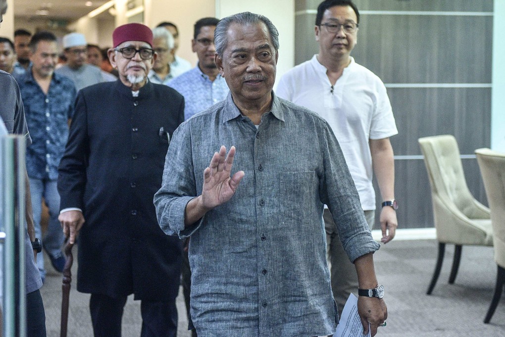 Malaysian former PM Muhyiddin Yassin, centre. Photo: AFP