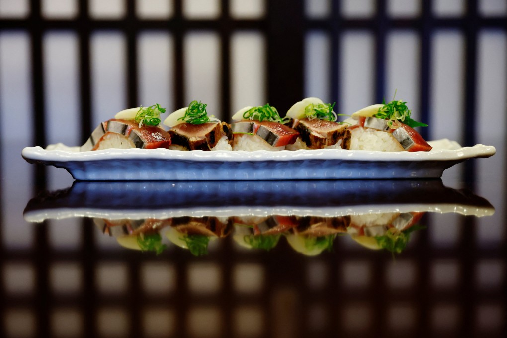 Other unsavoury pranks at Japanese conveyor-belt sushi restaurants included customers touching moving pieces of fish with a freshly licked finger. File photo: Reuters