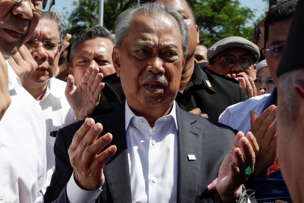Muhyiddin Yassin arrives to give a statement to MACC on March 9, 2023. Photo: Reuters
