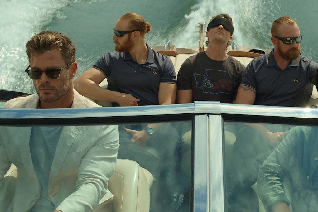 Chris Hemsworth (left) as state-of-the-art prison overseer Steve Abnesti, in a still from Spiderhead. Hemsworth and other actors have recently played “dangerous” tech bros, and Elon Musk isn’t happy. Photo: Netflix