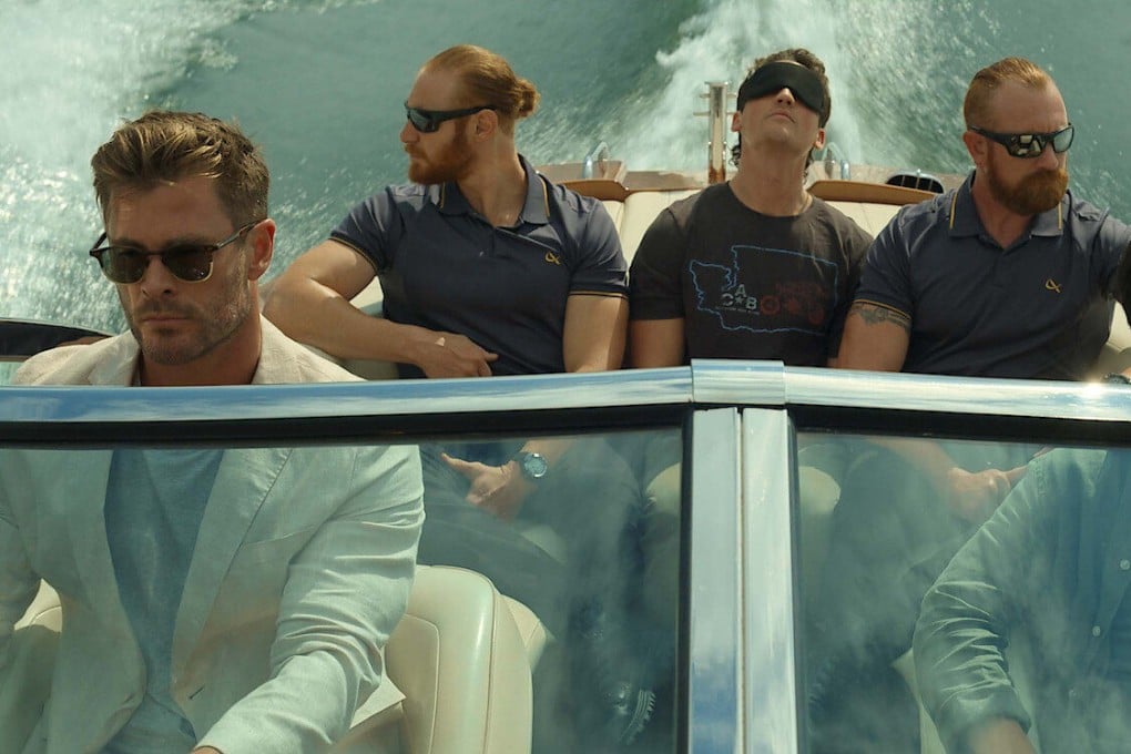 Chris Hemsworth (left) as state-of-the-art prison overseer Steve Abnesti, in a still from Spiderhead. Hemsworth and other actors have recently played “dangerous” tech bros, and Elon Musk isn’t happy. Photo: Netflix
