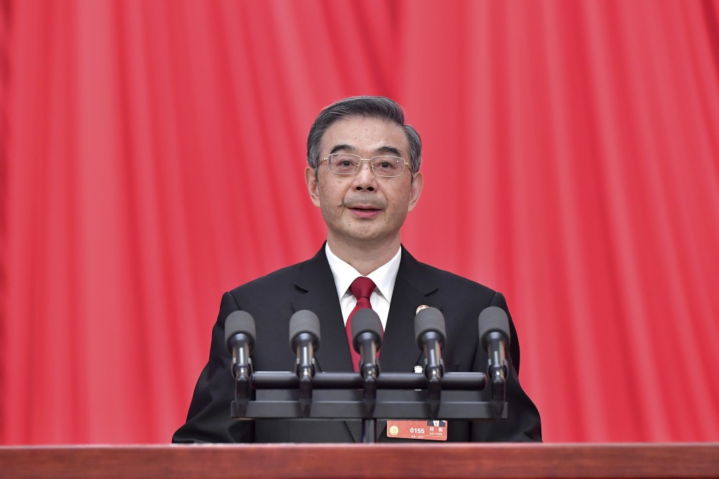 Zhou Qiang, president of the Supreme People’s Court, delivers a work report to NPC deputies at the Great Hall of the People in Beijing on Tuesday. Photo: Xinhua
