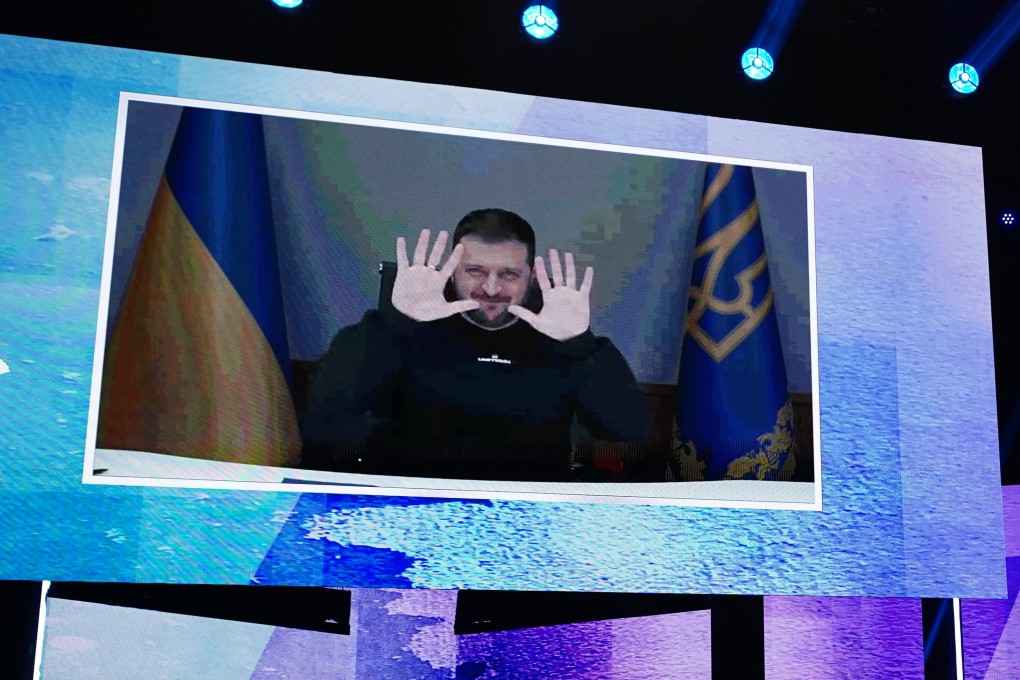 Ukraine’s President Volodymyr Zelensky appears on screen at the Opening Ceremony of the 73rd Berlin International Film Festival. Photo: EPA-EFE