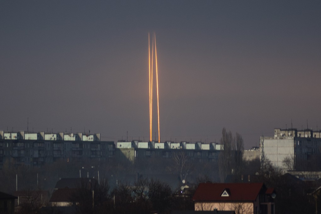 Rockets launched against Ukraine from Russia’s Belgorod region seen at dawn in Kharkiv, Ukraine, Thursday. Photo: AP