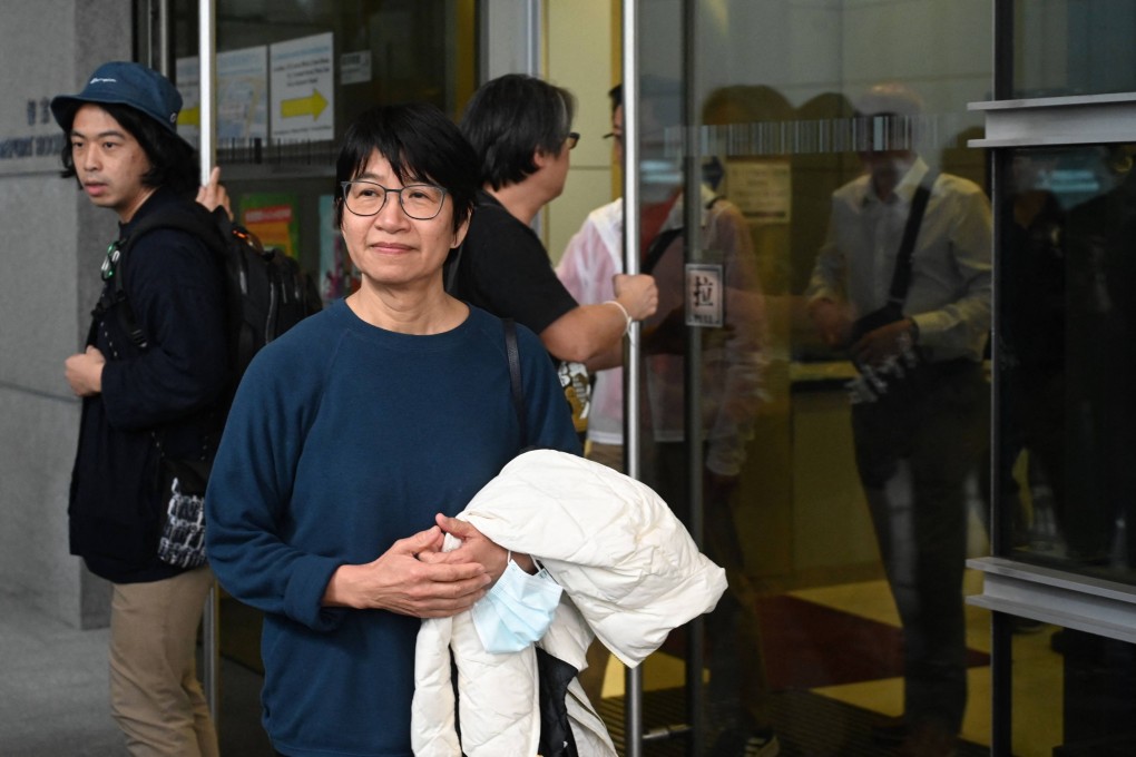 Elizabeth Tang leaving police headquarters in Wan Chai on Saturday. Photo: AFP