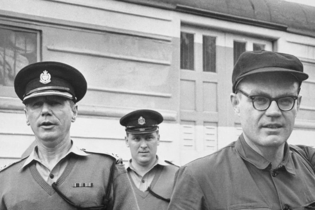 John Downey (right), a CIA agent imprisoned in China for more than 20 years, crosses from China into Hong Kong on March 12, 1973. The US government had long denied he was a CIA spy. Photo: Getty Images