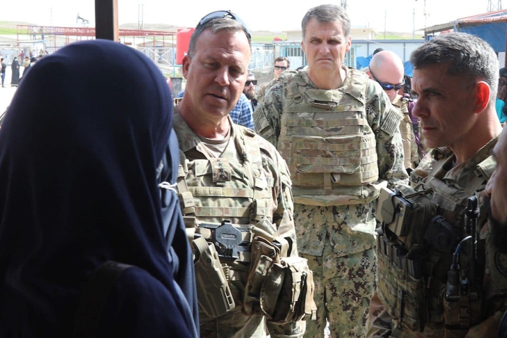 US Central Command’s General Michael Kurilla, centre, visits a camp that holds relatives of suspected Islamic State (IS) group fighters, in Syria’s northeastern Hasakah province. Photo: US Central Command (CENTCOM) / AFP