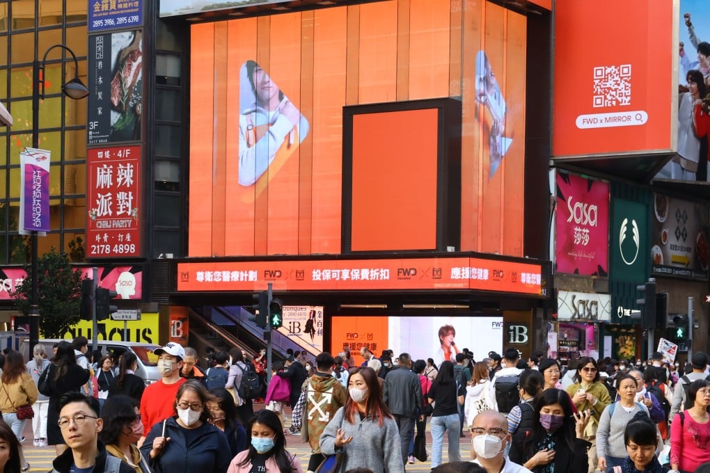 An FWD hoarding in Hong Kong’s Causeway Bay. The underlying value of the insurer’s new business increased to US$806 million last year, according to its prospectus. Photo: Dickson lee
