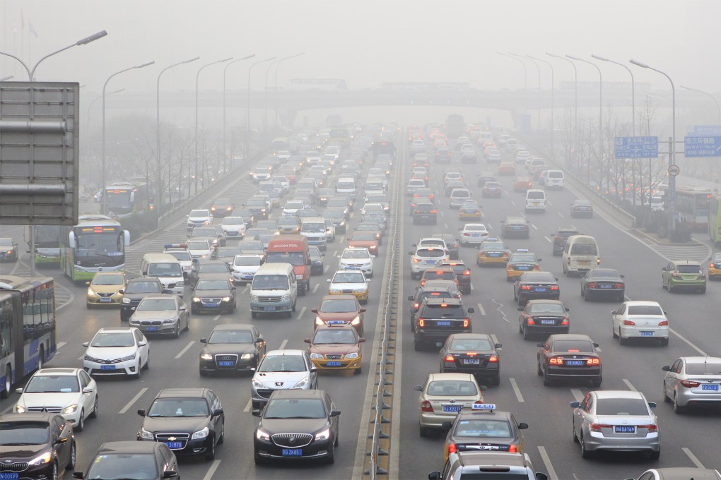 Traffic is seen at Guomao area, China in heavy smog. Photo: Shutterstock/File