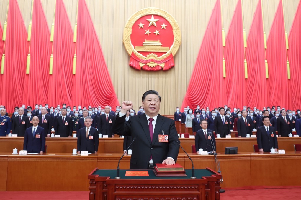 President Xi Jinping makes a public pledge of allegiance to the constitution at the Great Hall of the People in Beijing on March 10. Xi was unanimously re-elected president and chairman of the Central Military Commission. Photo: Xinhua