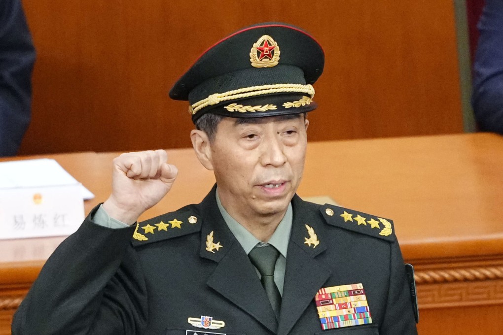 General Li Shangfu takes an oath after being elected as state councillor during the National People’s Congress in Beijing. He was also appointed as defence minister. Photo: Kyodo