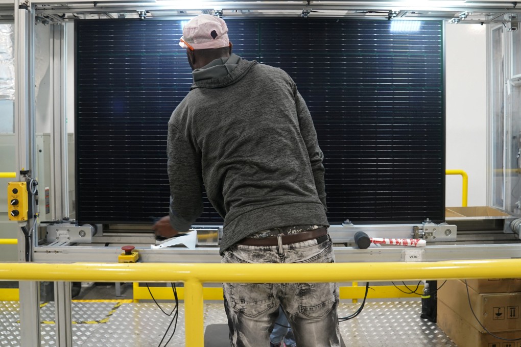 An employee works on solar panels at the QCells solar energy manufacturing plant in Dalton, Georgia, on March 2. The US industrial base has suffered from decades of decline and underinvestment, putting the country’s future economic stability at risk. Photo: Reuters