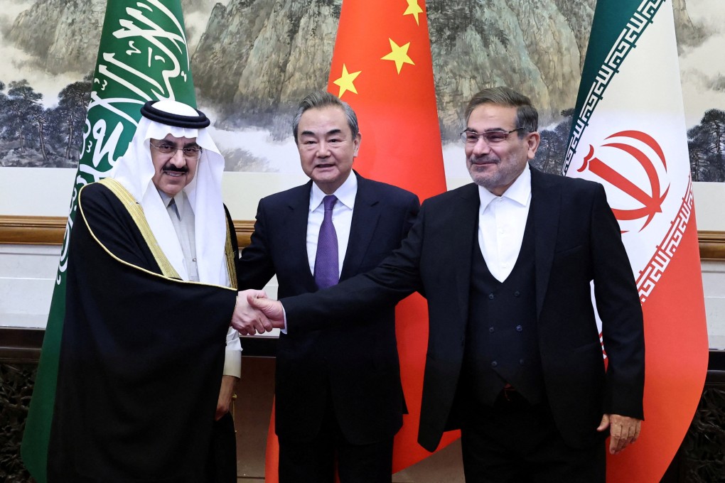 China’s top diplomat Wang Yi (centre) with Ali Shamkhani (right), secretary of Iran’s Supreme National Security Council, and Saudi Arabian national security adviser Musaad bin Mohammed al-Aiban in Beijing on Friday. Photo: Reuters