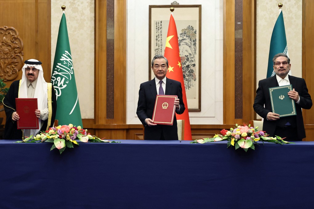 China’s top diplomat Wang Yi (centre) attends a meeting with Saudi Arabia’s national security adviser Musaad bin Mohammed Al-Aiban (left) and Ali Shamkhani, secretary of Iran’s Supreme National Security Council, in Beijing on March 10. Whether the China-brokered detente between Riyadh and Tehran holds will be keenly watched. Photo: China Daily via Reuters