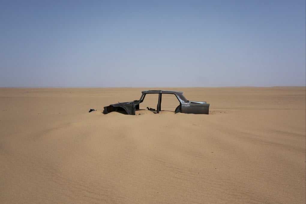 The frame of an abandoned car in Niger’s Tenere desert region in the Sahara, a favoured path for migrants. File photo: AP