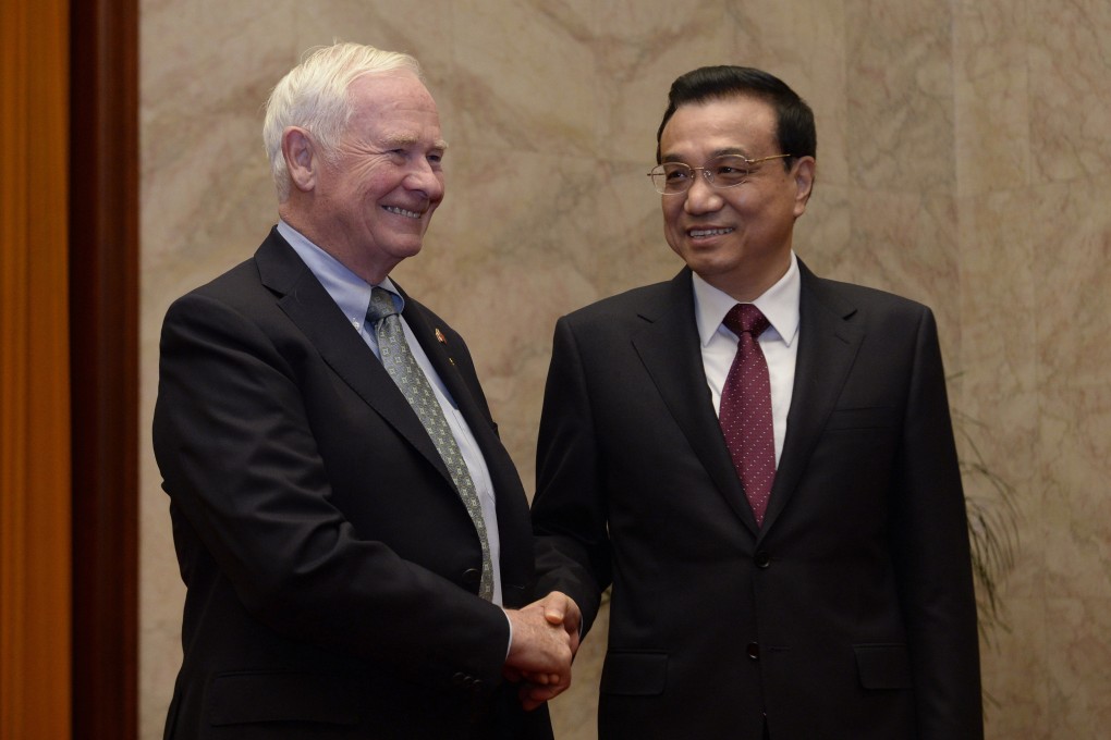 Canada’s then Governor General David Johnston, left, and then Chinese Premier Li Keqiang in Beijing, China in 2013. File photo: AP