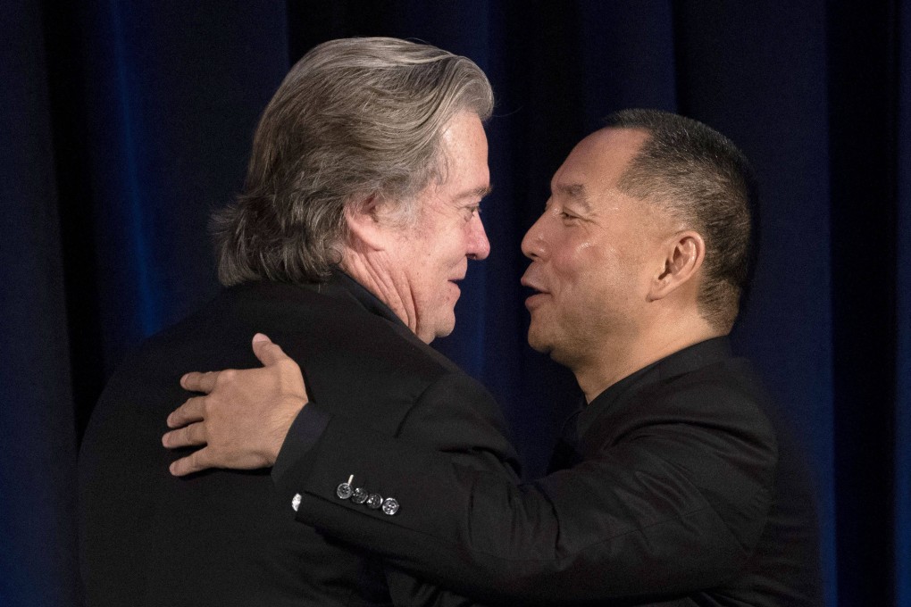 Former White House Chief Strategist Steve Bannon (L) greets fugitive Chinese billionaire Guo Wengui before introducing him at a news conference on November 20, 2018 in New York. Photo: AFP