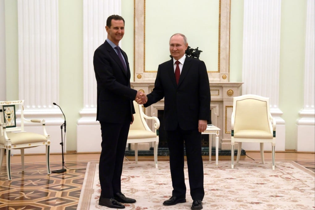 Russian President Vladimir Putin, right, and Syrian President Bashar al-Assad during their meeting at the Kremlin in Moscow, Russia on Wednesday. Photo: Vladimir Gerdo / Sputnik / Kremlin / EPA-EFE