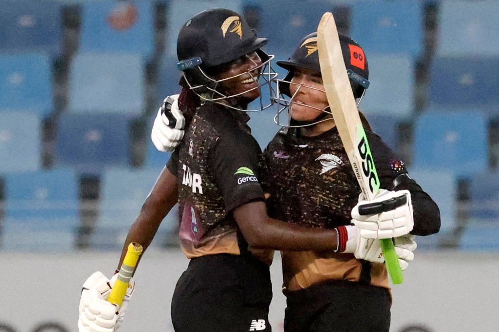Tornadoes’ captain Stafanie Taylor (left) celebrates with teammate Sune Luus after their win in the FairBreak Invitational 2022 women’s final at the Dubai International Cricket Stadium. Photo: AFP