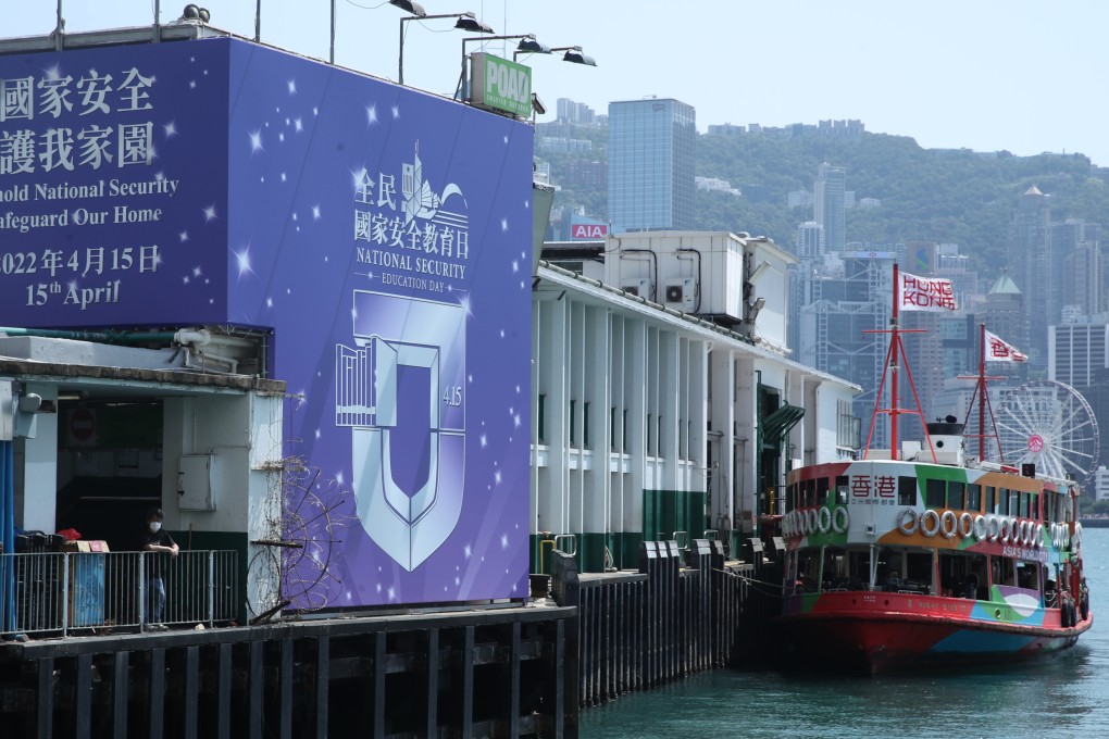 A banner promoting National Security Education Day flanks the ferry pier at Tsim Sha Tsui. Photo: Edmond So