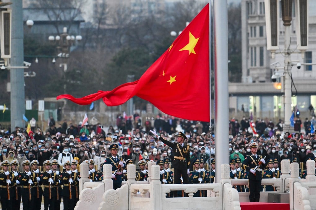 Hong Kong Chief Executive John Lee attends the flag-raising ceremony at Tiananmen Square in Beijing. Photo: Handout