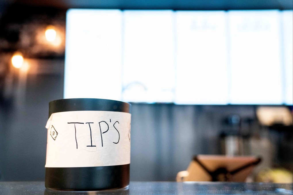 In the United States, a gratuity of around 15 to 20 per cent of the value of a meal is a must, as it often makes up the bulk of the waiter’s salary. Photo: AFP