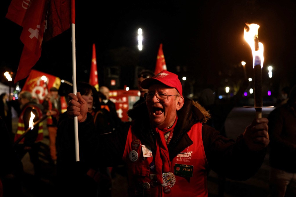 A protester shout slogans during a demonstration in Lille, northern France, on March 17, 2023, a day after the French government pushed a pensions reform using Article 49.3 of the constitution. Photo: AFP