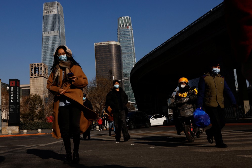 People walk on a street in Beijing, China. Photo: Reuters